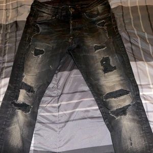 Washed Black skinny ripped jeans